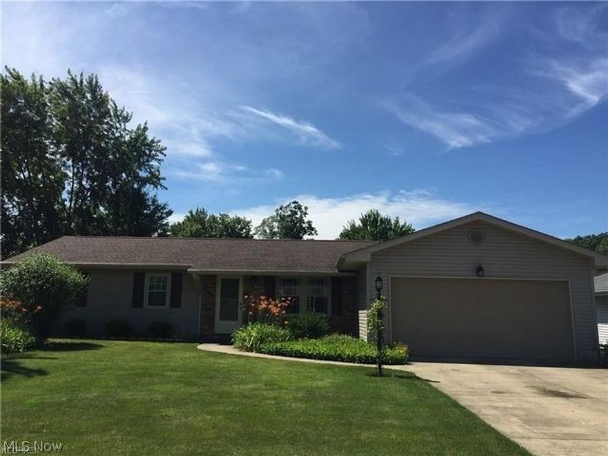 Phenomenal 3 Br 2 Bath Ranch in the heart of Austintown  Custom kitchen boasts gorgeous cabinetry with easy glide drawers, granite look counter-tops and Backsplash. Plenty of entertaining space within the eat in kitchen and breakfast bar. This one floor living home boast an open floor plan, with family-room, and living-room. Sliding doors off the kitchen lead to a fenced in yard, with a  20x16 concrete patio and large shed. 3 generous bedrooms with plenty of closet space. Oversized 2 car garage with electric and water.  Newer vinyl siding, roof and gutter guards for worry free living.