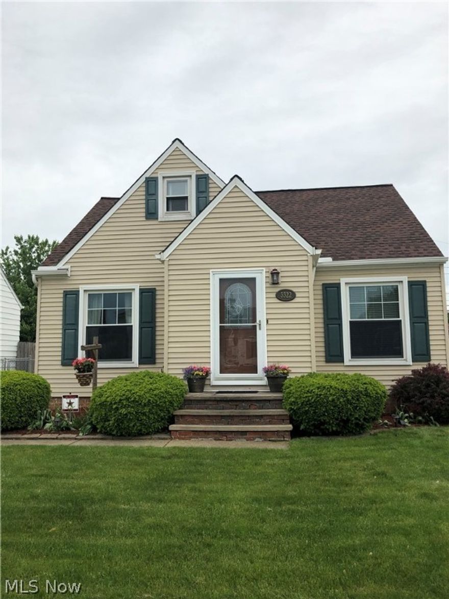 This beautifully maintained home has many updates including a newer furnace, vinyl siding, roof, deck, windows, and glass blocked windows in basement.
A two and a half garage makes it nice in snowy weather.  The basement is waterproofed with a transferrable warranty.  This home has been really pampered with so many major updates.  
It is in excellent condition and won't last long on the market