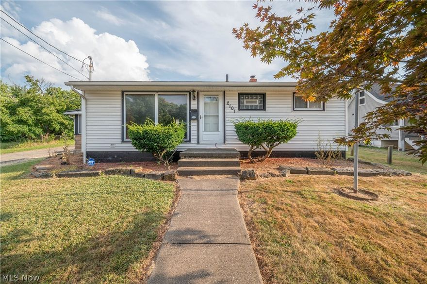 Looking for a ranch with a HUGE garage? Brand new roof just installed 11-2025! Inside, Hardwood floors in the open living room, and the kitchen has great cabinet and counter space. Three beds, one with the hardwood floors exposed. The full bath has a walk in shower. The basement is huge, was professionally waterproofed in the past per the owner. High efficiency furnace, Central air? Glass block windows and wide open basement with great potential for finishing further! 200 Amp electric panel. Laundry set up in the basement. Rough shower in basement ans well. Enclosed side porch is perfect for removing shoes before entering the home. Don't miss the exterior positives as well! The 24x26 garage can house 3-4 cars, motorcycles or other road toys and there's even electric and an attic for additional storage! Shed. Nice fenced in yard, with vinyl privacy fence in the back. Mini pond needs some love but great feature! YES, this one needs cosmetics, but there is so much potential here. Call today!