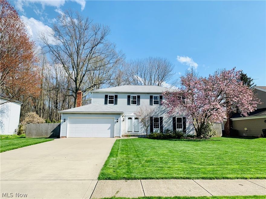 Welcome to this lovingly renovated and cared for Full of Natural Light Colonial Home situated in a well sought-after area. Enter into fresh colors home entry way with a super spacious living room to the right with built in cabinets wall for your great collections. Continue to a gourmet kitchen with cherry cabinets, gorgeous backsplash, stainless appliances, and granite counter tops. To the right of kitchen the tinted window doors leads to the dining room that was outfitted for an office / dining room with luxury Mohawk vinyl floors & tinted glass French doors open into a living room. A generous size family room featuring gas fireplace with sliding doors open to screened in porch with concrete stamped wrap-around patio overlooking the park like private fully fenced in yard with play dome, adult iron swing & firepit that stay. Second level consists of a remodeled master suite with built in master wardrobe and fully custom remodeled en suite with gorgeous showers, toto toilet privacy with