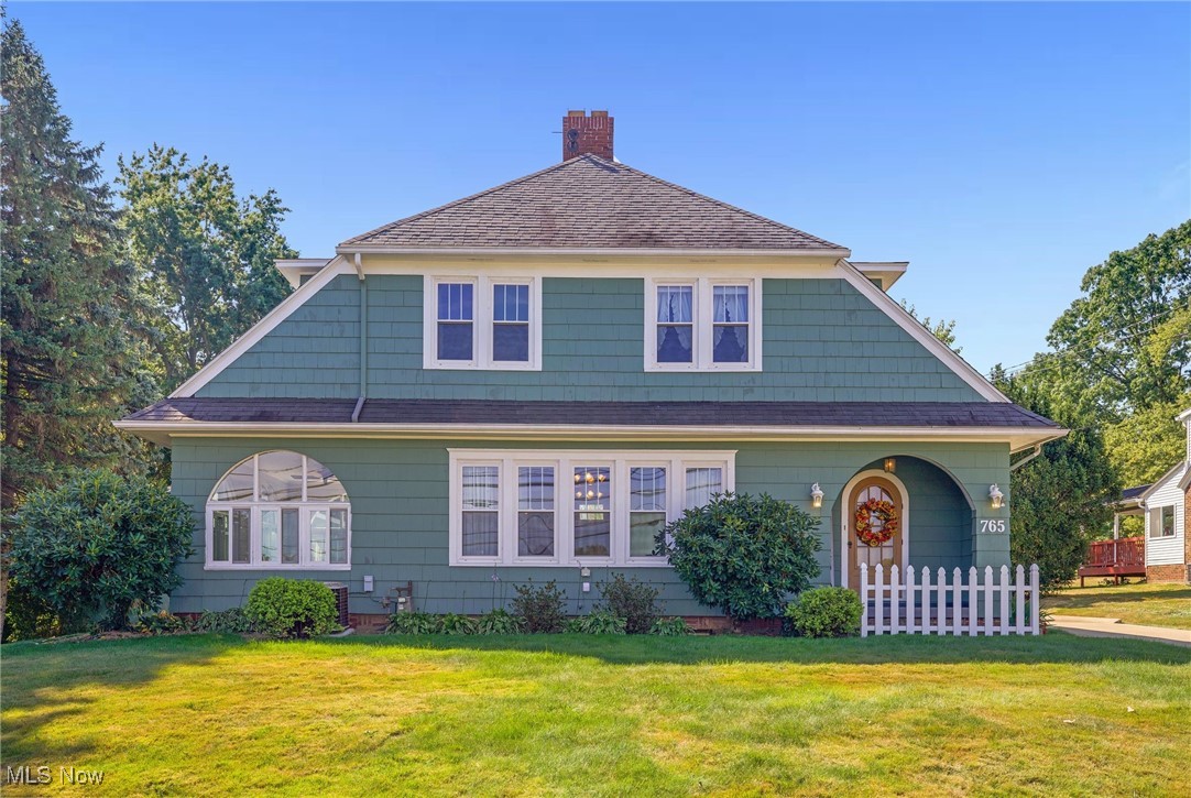 Charming Craftsman Colonial on a rare .8 acre lot! Step into nearly a century of charm & character with this classic home! Form original woodwork & arched doorways to crystal door knobs & a striking stone firepalce - timeless details are everywhere! This 4 bedroom 2 bath home features hardwood floors/ 2 fully renovated bathrooms - including a first floor bath with walk in shower - a airy eat-in kitchen w/ vaulted ceilings, skylights, granite counters & a bay window that fills the space w/ natural light. Enjoy the versatility of the 1st floor bonus room/office (perhaps a play room or craft area). The home features a gorgeous 4 season room-surrounded w/ walls of windows-perfect for morning coffee or relaxing at night. Enjoy a classic covered front porch the perfect spot to watch life go by. Outside the rare .8 acre lot in town offers space not often found in this location. The 1320 sqft garage/pole barn is a true standout! Complete with electric, water & a gas heater - this is ideal not only for your vehicles- but boats, campers, storage, hobbies or a workshop! Just steps away from both the middle & high school in the desirable Wadsworth School District. There is no shortage of opportunity to enjoy the outdoors with with home. Loads of parking.The property pairs historic character with modern amenities and an unbeatable location w/ a hard to find lot size. Minutes to Wadsworth Crossings, the YMCA, the Blue Sky Drive in & the Historic Main Street downtown -shopping, dining and more! Easy access to the freeway and less than 30 mins from both Akron and Canton. Don't miss out on the chance to own a home in this fabulous small town and be a part of this community! Call today for a private showing before it's gone!