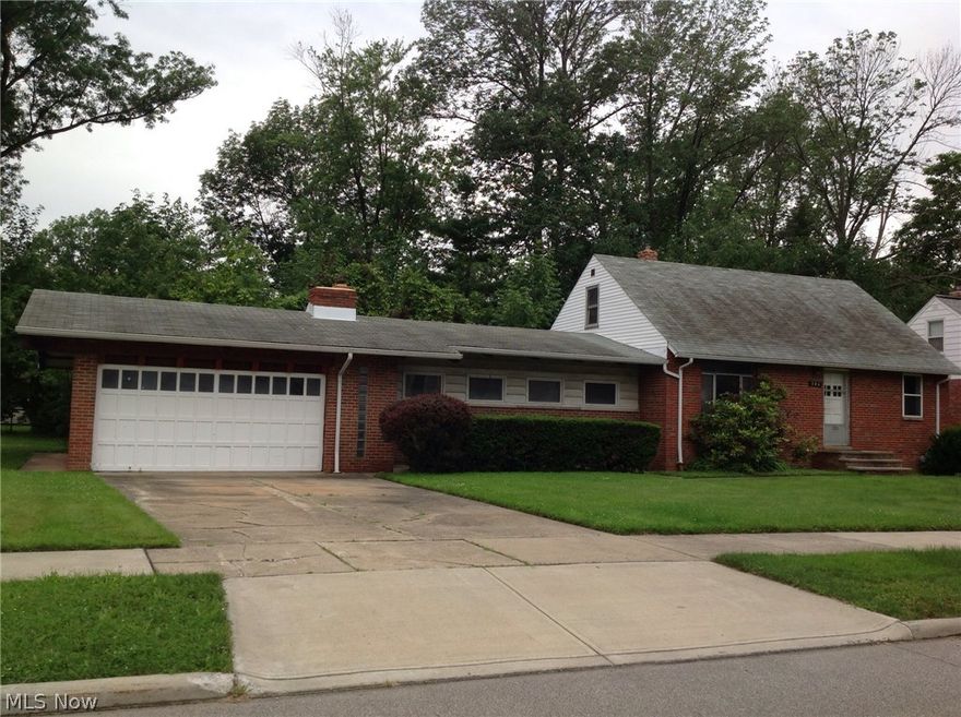Large double lot! Rare attached garage which sits on one of the lots. Extra large family room addition added on many years ago. House needs extensive work, basement needs waterproofed. Being sold AS IS. Buyer to assume all POS violations.