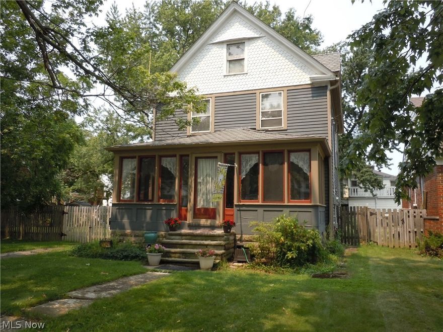 Spacious inside and out, this Center Hall Colonial is filled with living space, playing space and storage space.  Located on an oversized lot providing plenty of room for pets, children and outdoor enjoyment. A three season front porch expands your enjoyable living space and provides a special spot for bug free meals.  An updated eat in kitchen is filled with tons of convenient storage for all your kitchen tools. A bright living room is a special space  with a picturesque staircase to add charm.  A dining room with classic pillars and a convenient storage room complete the first floor. Upstairs the spacious style continues with three bedrooms and a full bath.  A walk-up attic, complete with stained glass staircase window really begs to be finished to add to your living space. A full basement with laundry and a half bath with lots of room for you to develop. Filled with possibilities and projects. Call Today to Schedule Your Private Tour!