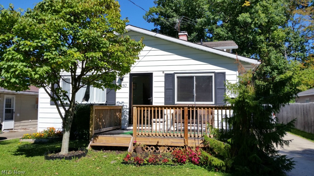 Updated 3 Bedroom 1.5 Bath 2 car garage, ready to move in! Wonderful fenced in rear yard with walkout basement! Very few homes in this price point in Aurora School District; home is ready to make your own, move in ready! Awesome sitting deck on front or patio at rear. Large fenced in rear yard, plenty of space! This is a main level home with a half set of steps to bedroom level and half to lower level Family Room, Recreation Room, with plenty of space for desk, large television, sofas & chairs! Large master bedroom with 2 additional bedrooms, ceiling fans in most rooms, kitchen appliances included, HOME WARRANTY! Hot Water Tank 2014, Patio added 2007, concrete drive 2006,High Efficient Furnace & Central Air 2007, Electrical box 2008, Front door & screen door 2009, Vanity in main bath 2010, Kitchen cabinets & countertops 2010, Closet in living room in 2011, Carpet downstairs & hallway 2012, Back door replaced 2014, New attic fan & bathroom exhaust vented to outside 2014, Over the last