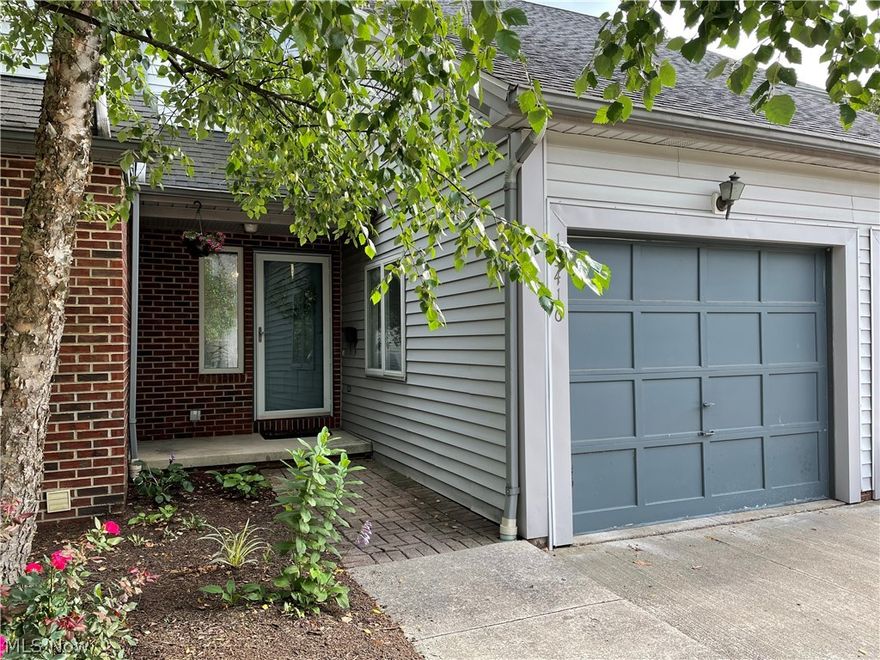 Tucked away on a cul-de-sac near Shaker Square, this two story condo offers you privacy and semi-seclusion while being only steps away from the amenities of city living.  The first floor provides open floorplan living with an updated kitchen and powder room, comfortable living room with hardwood floors with glass sliding doors leading to a private brick patio.  The 2nd floor has two large sized bedrooms each with two good sized closets.  The spacious, updated upstairs bath has dual vanity sinks for your convenience. The attached 1-car garage leads directly into the kitchen for ease of bringing in your groceries.  Super spacious basement (722 sq ft)  has roughed-in plumbing allowing for a bath and can be easily converted to a gym, media room, recreation room or extra bedroom.  This location could not be more perfect!  Close proximity to the hospital district, downtown, and Shaker Lakes! This condo is just a short distance to all the best restaurants and shopping that the Larchmere Neigh
