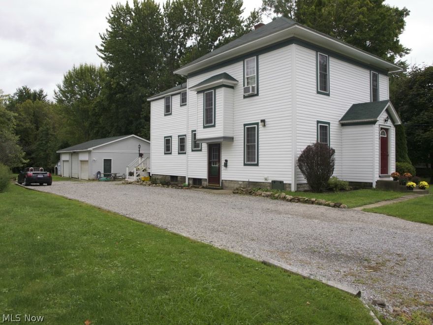 Built 1900 with century charm situated on 1 acre.  4+ bedrooms, large updated eat-in kitchen, dining  room, living room, additional room for office or bedroom, and office nook.   Updated kitchen, bath, water heater, high efficiency gas furnace & duct work.   New windows, siding, and 3 bay garage.  Complete list of updates available.