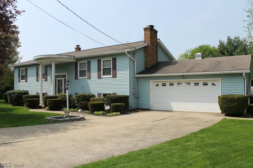 This lovely Lake Township home offers plenty of living space inside and out. The upper level includes formal living & dining rooms, nice kitchen, master bedroom with master bath, bedrooms two & three and main bath. The walk-out lower level could be used as an in-law suite & includes family room with wood burning fireplace, wet bar, sliding doors to enclosed porch, possible 4th bedroom/rec room/man cave/exercise room, 3rd full bath, utility room & door to patio. ..2730 square feet in all. There are entrances to the garage from both the upper and lower levels. The patio & enclosed porch are surrounded by a white vinyl fence for your privacy.  If that’s not enough, there are TWO storage barns at the back corner of the property. This home has the added convenience of public water & sewer. Windows were replaced in the last 5 years.