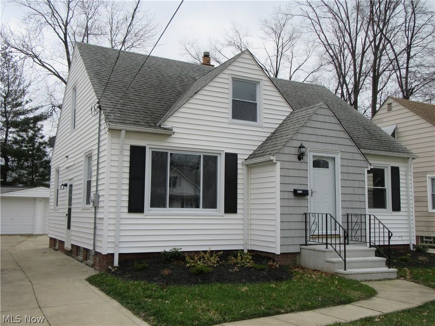 Beautifully remodeled bungalow with finished basement.  The kitchen boast all new soft close cabinets, ceramic floor, stone back splash and stainless hardware.  BOTH bathrooms have been completely remodeled with ceramic tile and new tub/shower with new vanities and hardware.  All windows and doors have been replaced.  Brand new carpet and paint throughout.  the basement is partially finished for a rec room and has a very large utility/laundry room with tons of storage.  Glass block windows, newer Trane furnace with central air and new H2O tank.  New concrete for a back patio for outdoor entertaining completes the home.  Ready for you to move right in.