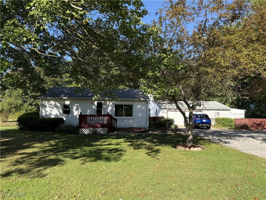 Country living that's less than fifteen minutes from Warren or Youngstown. This well kept two-bedroom one-bathroom home is nestled on 1.5 acres in Vienna. Additions include a beautiful four-seasons room that overlooks the serene backyard, and a large utility room with first floor laundry. The three-car garage has a double door that faces front and a single door that faces the backyard. Updates include furnace, central air, and hot water tank all in 2021, Whirlpool Whole House water filtration system in 2025. Also includes a large shed/outbuilding in the backyard and another attached to the garage.