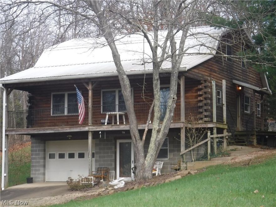 Country Log Home and acreage centrally located from Coshocton, New Concord and Zanesville. Beautiful large yard includes stocked pond, woods, 64x36 pole barn with concrete floor and electric for all your toys! Very well maintained home includes 31x30 unfinished loft and full basement for expansion. Fenced back yard, Generac power backup and wooded acreage across the road includes complete RV hookup and fire pit. Amish neighborhood. Too much to list!