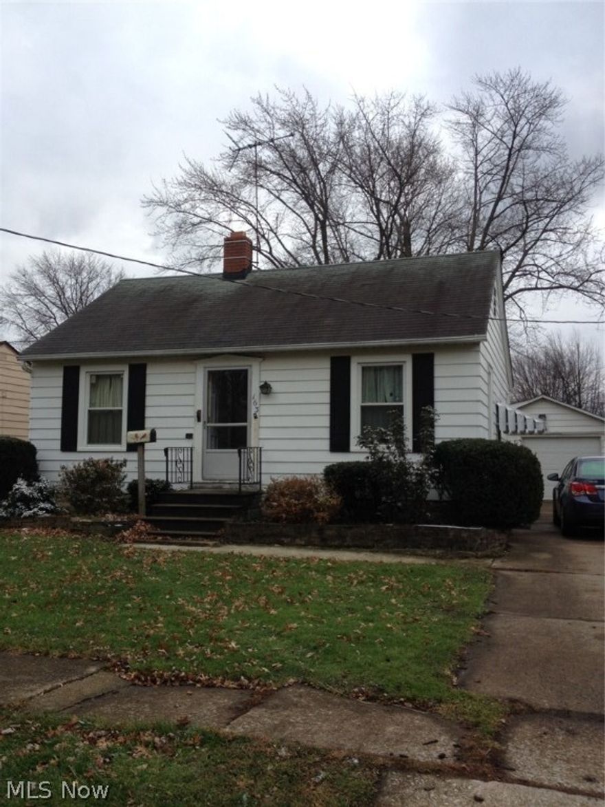 Small Ranch with 1 car detached garage with woodshop area. Some TLC would make a big difference!