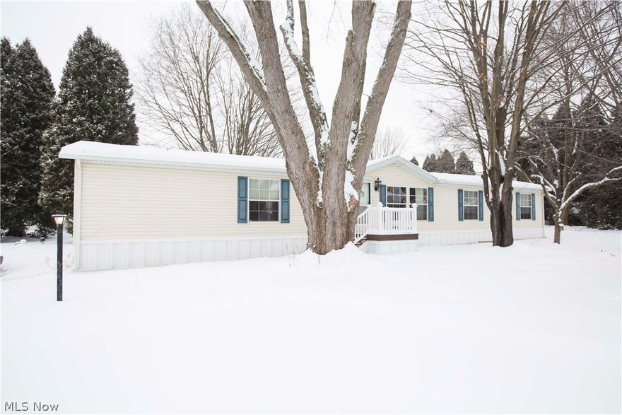 Welcome home to this newly remodeled 4 bedroom, 2 bathroom one floor living home! Entry way foyer leads to a formal living room with picture window.  The home has an open floor plan with cathedral ceilings throughout.  Expansive gourmet  kitchen with  stainless appliances, built in wine fridge, oak cabinets, recessed lighting and ample counter space.  Large great room with stone corner fireplace and dining room with views of the landscaped corner lot.  There is a first floor laundry room, 4 bedrooms, and 2 bathrooms.  Guest bath has custom vanity's with vessel sink.  Master en-suite boasts multiple closets, and spa bathroom with double tiled walk in shower, corner soaking tub, dual vessel sink vanity with a modern farmhouse feel and gorgeous tiled hard wood floors.  Exterior of the home has mature landscaping and 2 tiered deck for all of your entertaining needs.  Home warranty included.
