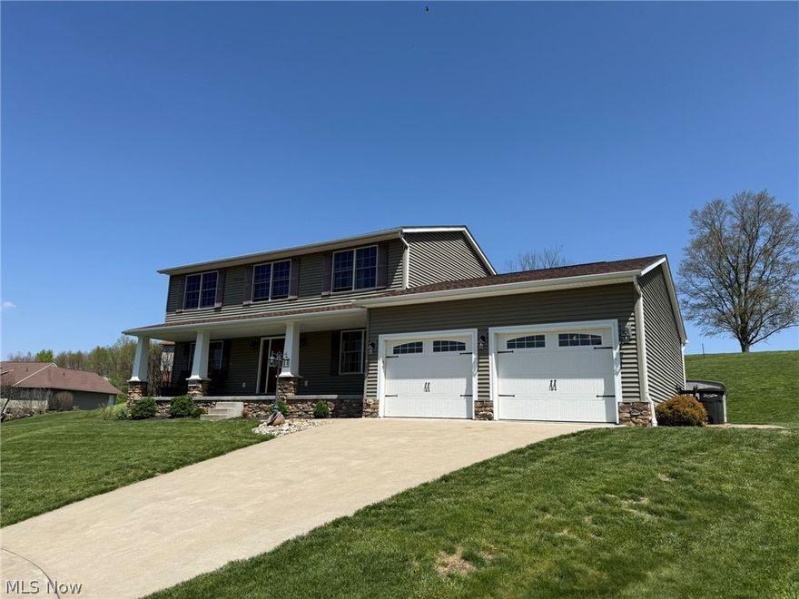 Spacious 4 bedroom, 2.5 bath stone and vinyl sided home.  Open floor plan with wood laminate flooring. Island breakfast bar in the kitchen features Corian counters and walk in pantry.  Glass doors in the dining room lead to the 14 X 10 covered rear patio with ceiling fan and additional two pavered patios with built in fire pit and lighted retaining wall.  French door lead to the main floor office.  Main floor laundry includes built in cabinetry and sink.  Walk in closet in the master suite with full bath.  Double sinks, 6' tile walk in shower and soaking tub in the master bath.  Full, 13 course basement stubbed in for additional bathroom.  Pella windows throughout.  New gas hot water heater in 2025.  2 car attached garage.  Tastefully landscaped lot.  Private backyard in a country setting.  Excellent location on a quiet cul-de-sac in Goshen Glens.  Appliances not warranted.  Exclude washer and dryer.