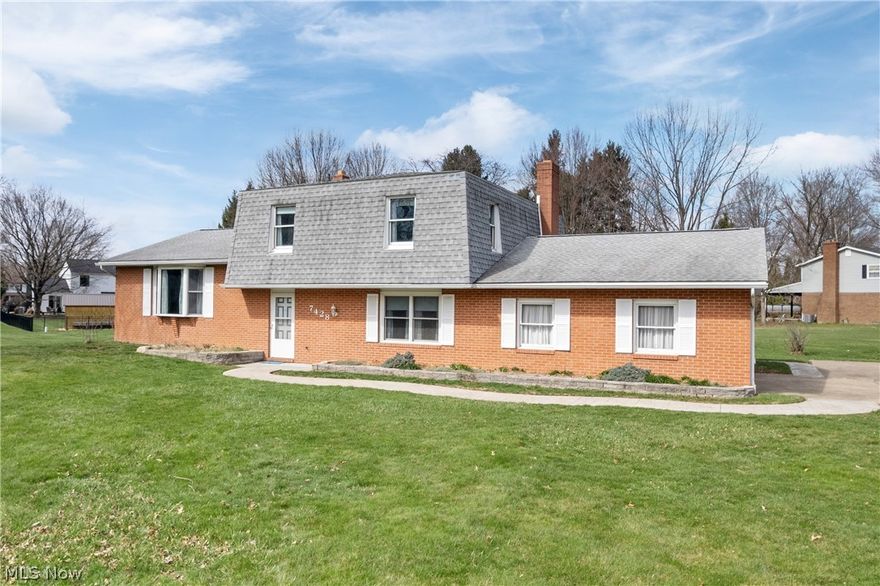 One-Owner, Custom-Built Split Level Style & Pride of Ownership

Welcome to this beautifully maintained one-owner modified split-level home, offering 2,364 sq ft of above-grade living space and thoughtful design throughout. Well built and meticulously cared for, this home truly shows pride of ownership at every turn.

The inviting living room features hardwood floors and a stunning fireplace, and flows seamlessly into a four-seasons room surrounded by wraparound windows—perfect for relaxing year-round. Step outside to the paved patio, ideal for entertaining or enjoying peaceful outdoor moments.

The dream kitchen offers abundant space, beautiful cabinetry, and a large island, while the formal dining room easily accommodates a 10-person table, making it perfect for gatherings and holidays. A flex bedroom or home office and a full bathroom complete the first floor.

Upstairs, the primary suite includes a private full bathroom, along with two additional bedrooms and another full bath, offering plenty of room for family or guests. The lower level provides ample storage and the opportunity to finish additional living space if desired.
Oversized 2 car garage.
Enjoy peace of mind with major updates already completed: Furnace & A/C (2017), hot water tank (2022), and roof within the last 10 years and Peachtree windows (90’s).

Located in a highly desirable area of Jackson Township, this well-cared-for home offers space, comfort, and an excellent location. Homes like this don’t last long—schedule your private showing today!