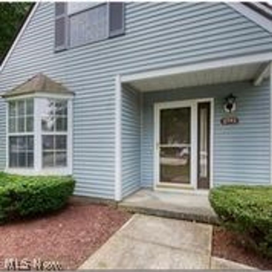 Ready to Move In and call it HOME! This sparkling, well-maintained end unit in Tinker's Lane is ready for your personal touches.  Perfect for entertaining, the large great room can accommodate plenty of dining and sectional furniture pieces. The room has a large window and a wall of patio doors with a wonderful view of the newer cement patio and park-like back area. This patio can easily accommodate several seating areas and plants.  The eat-in kitchen has been updated with white cabinets, laminated wood flooring, and newer stainless steel appliances. Upstairs are two generously-sized bedrooms with vaulted ceilings and a large bath with a walk-in shower and garden tub.  The larger bedroom has a long closet easily accessible from two doors, and the other bedroom has a sizeable closet with convenient shelving. The laundry room on the first floor houses the furnace and water heater, a great space for washer and dryer, and a large utility closet. Be sure to make an appointment to view this