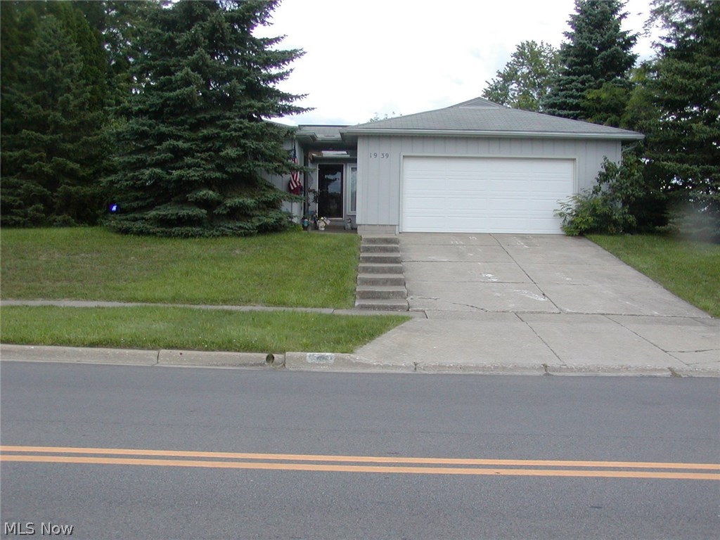Lot: 90 X 164 Roomy, beautiful custom built ranch on large city lot. Large master bedroom with private shower bath, walk-in closet. Glass block windows in partially finished basement with crawl space for storage. Dining room with vaulted ceiling. Wood burning fireplace in living room. Glass doors from living room to private deck and yard. First floor laundry. Furnace under 5 years old. America's Preferred Home Warranty included.