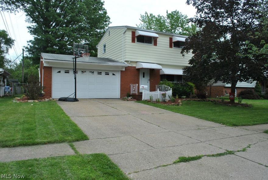 Over 2100 finished Sq ft Brick Colonial with finished basement, 400 Sq ft addition, and a ton of updates located on Elyria's North Side (near LCCC). A/C 2011, Blown in insulation 2013, Electrical upgraded 2014, Newer roof, Hot water tank 2014, kitchen remodeled in 2007 w/ new counter tops, flooring, ceramic tile back splash, ceiling fan, neutral paint. Windows replaced in 2014. The first floor (1/2) bath and second floor (full) bath both completely remodeled floor to ceiling in 2008. The finished basement has been turned into a large home theater. Bsmt has been waterproofed. As you walk into the home the 1st thing you will notice is the beautiful formal living room w/ oversized picture window to let in natural light and freshly finished true hard wood floors. Off of the Living room is the recently updated eat in kitchen which has beautiful French doors that open into the large family room w/ wood burning fireplace. You can access the fully fenced in Backyard w/ a partially covered conc