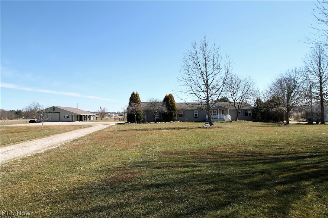 Welcome to this 3 bedroom, 3 full bath ranch home sitting on over 6 acres of tranquil beauty. New floors & lighting in this gorgeous open concept home. Family room is open to the kitchen & dining room. The bright, updated large kitchen has new cabinets, counters, farm sink, under cabinet lighting. Shiplap accent walls. Expanded eat in kitchen with new coffee bar. The dining room has a gas fireplace with stone backing. Luxury master suite offers His & Hers master baths(2020). His bath has new titled shower & tiled floor, all new vanity, counters, toilet, lights, wood accent wall, walk in closet & skylight. Her bath offers a soaking tub, new vanity, counters, toilet, sink, accent wall, new flooring, walk in closet. Countertop has built in bathroom appliance holders. Master suite has new trim work, lighting, 2 point with reading nook. There are 2 more bedrooms & the laundry room with outside access is on the main level. Huge basement with tons of potential. Guest bath recently remodeled