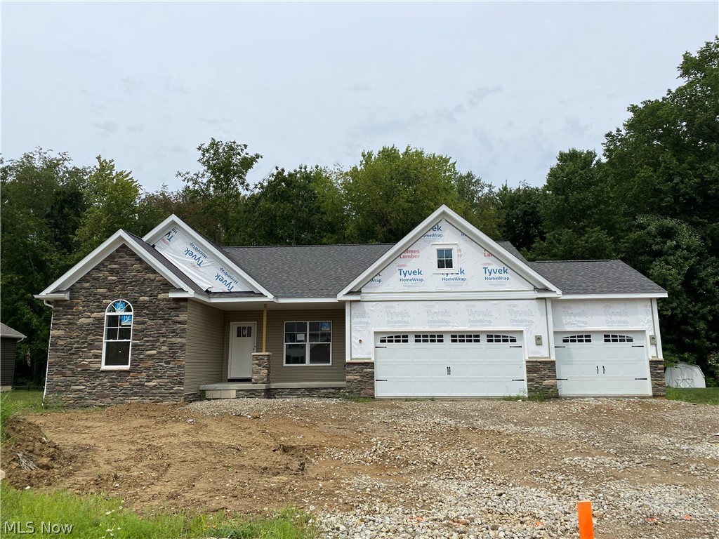 Brand new construction home will have 3 bedrooms (with carpet) and 2 full baths. Walk up to the large front porch and entry foyer with interlocking LVT floors and 9' ceilings. The office/study is located to the right, and bedrooms 2 and 3 are left with a full bath. The open concept kitchen boasts custom kitchen cabinets and a contrasting island with granite counters. The great room has a fireplace. The Master bedroom is tucked away and has a walk-in closet, a master bathroom, and a linen closet. The basement will be plumbed for a full bath. Estimated completion date 09/30. Taxes reflect the land value only. (Photos of a similar home for illustration purposes only).