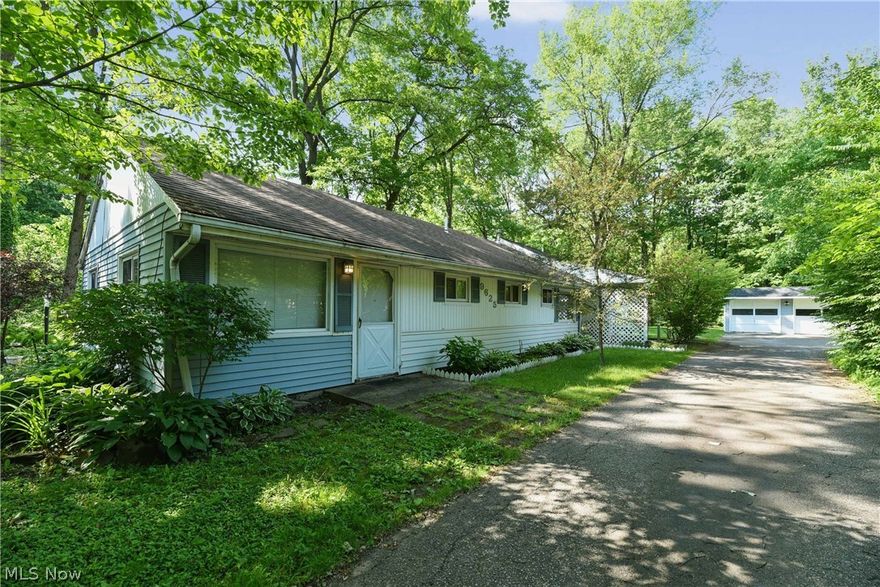 Riverfront ranch home in Olmsted Falls!  This home is set on wooded ¾ acre with Baker’s Creek alongside and Rocky River behind, with a screened in porch and private deck to enjoy the views all year long! The home is accessed from a shared private driveway, has 2 bed, 2 full bath with eat-in island in the kitchen and 9 foot ceilings in the living room. As if that isn’t enough – home has private exterior access to attached in-law suite that has additional 1 bed, 1 full bath, full kitchen and laundry! (suite is currently rented out on a month-to-month basis) This is a great income producing property, or a place to call home on the river. A must see! 
Please note: home is not in a flood plain. Septic tank was just replaced.