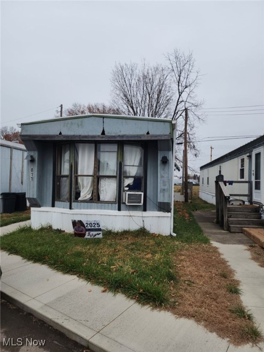 Bring your tools and make it your own.  2 bedroom, 1.5 bath home.  Convenient 1 story living.  Stainless steel range in the kitchen.  Exclude refrigerator.  Subject to park approval, $45 application fee for credit and background check.  RLM park rules and regulations apply with $250 monthly lot rent.  18 month lease required.