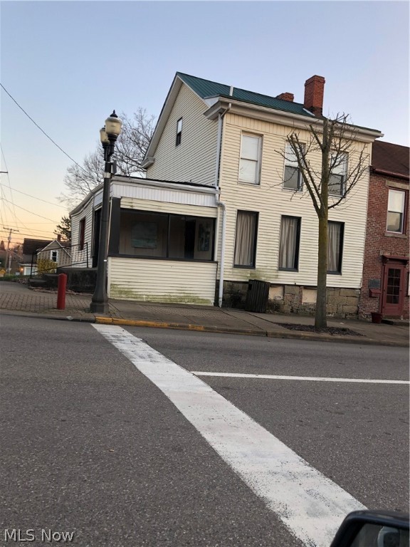 Building on corner of Sugar and Main Street. Being sold in"as condition." Great parking