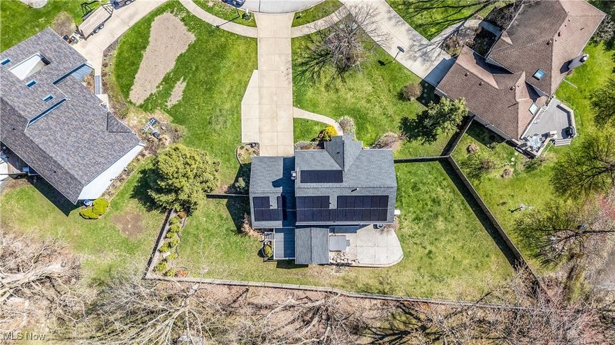 Situated on an idyllic cul-de-sac in a mature and coveted Westlake neighborhood - this stately 4 bedroom/2.5 bathroom colonial makes a great first impression...It's appeal at first glance is undeniable - with handsomely colored vinyl siding and stone fascia work (completed 2024), extra wide driveway w/ additional parking spot, and NEWER ROOF/GUTTERS (completed in 2022). The strategic and lovely outdoor updates don't stop there...in the backyard you will find a TREX COMPOSITE COVERED DECK and STAMPED PATIO overlooking the fully fenced in backyard, creating a true backyard sanctuary. Once inside the home, you will immediately notice the commanding staircase, two separate living areas (one w/ a fireplace), a formal dining room overlooking the backyard, "open concept" kitchen w/ eat-in space, half bathroom, and MAIN FLOOR LAUNDRY. The kitchen includes a neutral white cabinet w/ dark granite counters and chic black stainless steel appliances. Upstairs are 4 generously sized bedrooms and 2 FULL bathrooms. One of the full bathrooms is en-suite to the primary bedroom and has a dual vanity along with an updated shower. The 1,256 sq ft unfinished basement is a blank canvas for the next owner to finish to their liking. The perfect opportunity to own a home with most of the "big ticket" items taken care of by the current owner...Other updates include: composite deck and stamped patio (2020-2022); shower remodel master bath (2024); new front door/side windows (2025); "forever floors" coating in garage (2024); whole home solar panels w/ backup battery (2023); Generac whole home backup generator (2024); whole home air purifier (2021); whole home "smart temperature zones" (2021); new sump pump w/ backup battery (2022); garage door w/ myQ smart home keypad (2021); EV charger in garage (2023), radon mitigation system...Schedule your showing today!