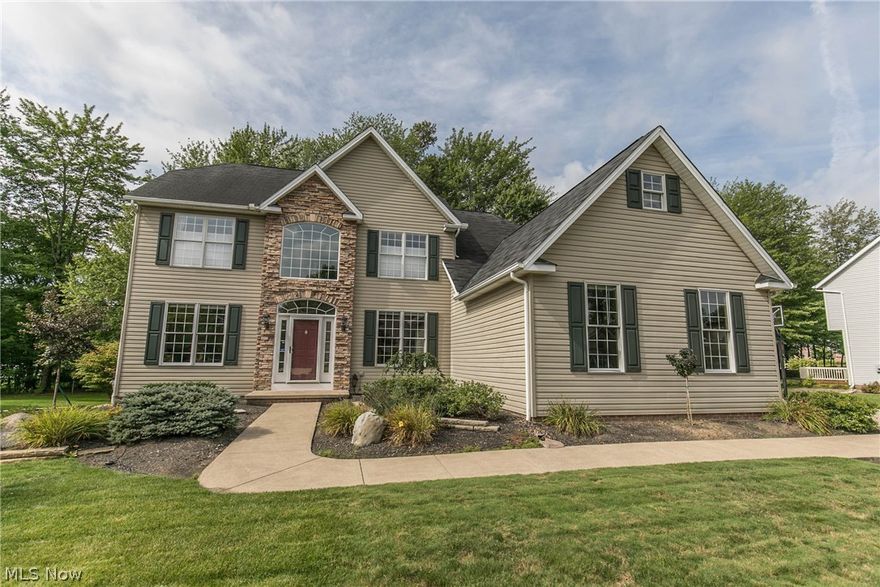 Stunning Colonial! You Are Greeted By Two Story Foyer, Formal Living Room, Formal Dining Room, Family Room With Two Stories and Fireplace. First Floor Den and Laundry. Kitchen Open To Family Room Boasts Maple Cabinets, Granite Counter Tops and Ceramic Tile Flooring. Second Floor With Master With Vaulted Ceiling, Double Sinks, Soaker Tub, Separate Shower and Private Commode. 3 Additional Bedrooms All With Ceiling Fans, Ample Closet Space and Carpeting. Finished Lower Level With Full Bath, Exercise Area, Recreation, Bar Area and Storage. Side Entry 3 Car Garage With Built-In Shelving, Hot and Cold Water and Heater (Not Hooked Up, But Will Stay). Private Lot With Custom Storage Shed, Fire Pit Area and Professionally Landscaped. Large Deck and Grill Area. All Appliances To Stay Including Washer and Dryer. Additional Features Include: Security System, Sprinkler System, Extensive Exterior Lighting, Hot Water Heater 6 Years, Kitchen Remodel 2011, Super Energy Efficient Extra Insulation. Roof,