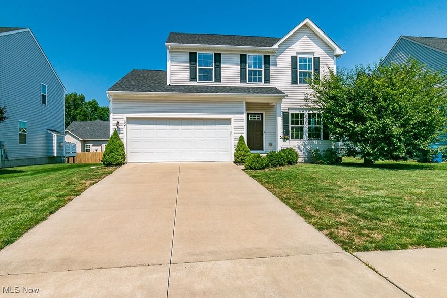Welcome to this beautiful Colonial in the desirable Heisley Park community, offering 2,240 sq. ft. of above-grade living space and an additional 470 sq. ft. in the finished lower level. This home effortlessly blends modern comfort with stylish design. The open-concept main level boasts a spacious eat-in kitchen with stylish cabinetry, flowing into a cozy living room ideal for gatherings. A bump-out dinette with full windows overlooks the fully fenced backyard and patio, enhancing the home's inviting atmosphere. Upstairs, the primary suite offers a private ensuite bath and walk-in closet, complemented by two additional bedrooms, a loft, and another full bath. The sound-insulated home ensures tranquility throughout. The finished lower level provides a versatile family room or gaming area, with ample utility and storage space. Outside, enjoy the fenced backyard and patio, perfect for outdoor living. The attached 2-car garage adds convenience and storage. Don’t miss your chance to experience luxury living in this exceptional home. Schedule your private showing today!