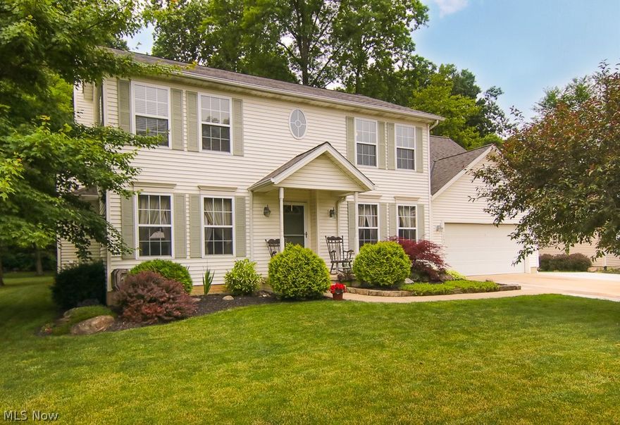 Welcome Home to this beautiful colonial with a nice neutral palette awaiting your decorating touches!  New first floor carpet 2018.  The ample oak kitchen boasts plenty of cabinet space and counter tops for the cook in the family.  Entertain or watch the kids play with open floor plan to family room. Cozy up in front of the wood burning fireplace with gas ignitor. The front room is great for formal entertaining, a home office or a playroom with French doors to close off to the family room.  Ready for the holidays? Enjoy family dinners in the formal dining room.  Step out onto the large paver patio which overlooks the beautiful private backyard with wooded hill behind.  Master bedroom is fit for a king with walk in closet Master bath features dual sinks, soaking tub, separate shower, linen closet and water closet.  Bedroom over garage is truly a bonus room with two large closets.  Two more spacious bedrooms complete the second floor.  Close to Rte. 2, I-90 and shopping!  Amherst schools