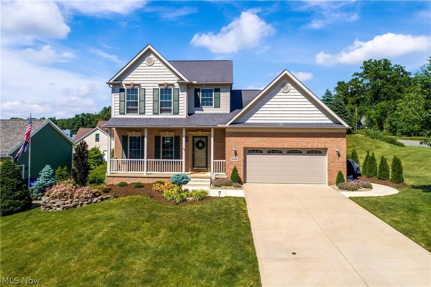 Honey, we're home!  Welcome to 2495 Buckeye Blvd located in the Butternut Ridge in Brimfield Twp.  Dutch Heritage built, this 3 bedroom 2.5 bath colonial with a walk-out lower level has many exciting updates. Kitchen updates include granite countertops & island, travertine tile backsplash, under mount sink, faucet and disposal. New padding and carpet in the living room installed in Sept ember 2020. First floor laundry.  Spacious master bedroom with vaulted ceilings, two walk-in closets & en suite with soaking tub.  New LVT flooring in hallway on 2nd floor and in bathroom. Trim around exterior windows, shutters, exterior block and garage interior were painted in 2019. Wayne Dalton insulated garage door and opener, NEW, in May 2020.  HWT in December 2020.  New expansion tank and relief value in 2016.  12x16 barn / shed in 2019. Barn / Shed features include double loft with ladder access, steel double door entry and single door side entry. A sliding glass door allows access to the recentl