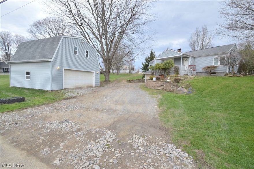 Ranch home on over 2 acres in Crestview Schools.  The main level of this home plays host to a living room with fireplace, kitchen, formal dining room, three bedrooms and a full bath.  Hardwood floors and newer windows exemplify the outstanding features this home has to offer.  The partially finished lower level adds a family room, recreation room, and half bath, as well as ample storage.  Exterior features include a large front porch, one car attached garage, and a 25 x 25 outbuilding with 2 car garage door access and loft area.  The home is protected with a 1 year seller paid home warranty.  Call today!!