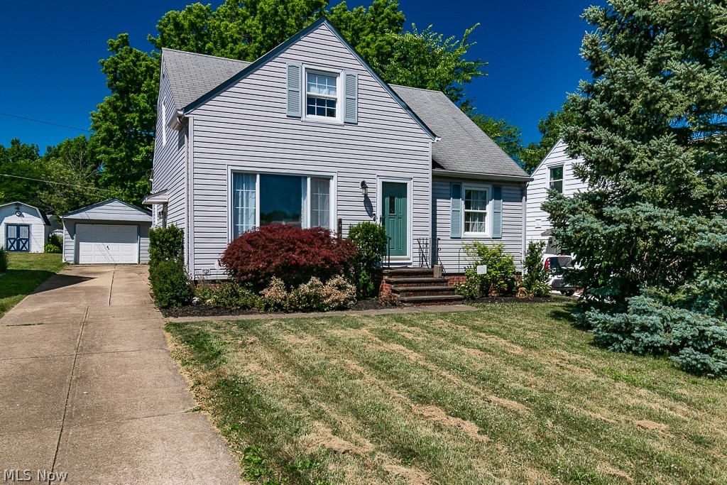 Welcome home to this charming updated 3 bedroom, 2 full bath bungalow in a highly sought after area of Wickliffe! Enter front door to a modern living room with hardwood floor, coved ceilings and large front picture window w/ tons of natural light. The updated eat-in kitchen features granite counters, tile backsplash, newer stainless steel & black appliances, modern track lighting, pantry cabinets and a built-in corner cabinet. Off the kitchen is a slider door to a spacious 3 season sunroom, remote operated string lights stay. You will also find 2 bedrooms w/ hardwood floors, a hall linen closet and full bath with tub/shower on the first floor. Make your way upstairs to the beautifully remodeled master suite which includes large walk-in closet with built-ins and access to lighted attic storage space. Master bath includes a tiled shower w/ jetted tub, built-in shelves and a huge linen closet! Full basement w/ rec room side just waiting for new owner to finish it and laundry side is plumb