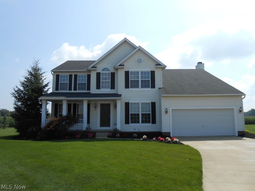 Beautifully updated home at the end of a cul-de-sac backing to farmland. Ceramic tile floors and granite countertops in the kitchen and baths. Mosaic tile backsplash in the kitchen. Kitchen is open to the dinette with patio doors to the 15 x 22 deck and the spacious 17 x 18 Family room with gas fireplace. The foyer boasts hardwood flooring and 17 foot tall ceilings! The formal dining room has crown molding and chair rail. Owner's suite has an 11.5 foot vaulted ceiling. Master bath has a long double vanity, soaking tub, and separate shower. Huge walk-in closet off of the master bath. 1st floor laundry room. The finished basement offers a rec/play room with sturdy built-in shelves, wet bar with fridge, and an awesome home theater room, complete with huge screen and equipment. There is a half bath and another small finished room in the basement as well. Sump pump has battery back up. Gorgeous landscaping and lovely deck!
