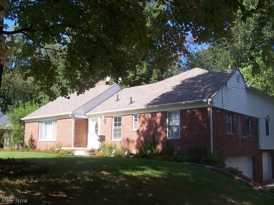 Remodeled and fully applianced kitchen, nice recreation room with fireplace plus a full bath, family room addition with loft - perfect for office or play room, 3 car garage, deck and private fenced yard. No pets please.