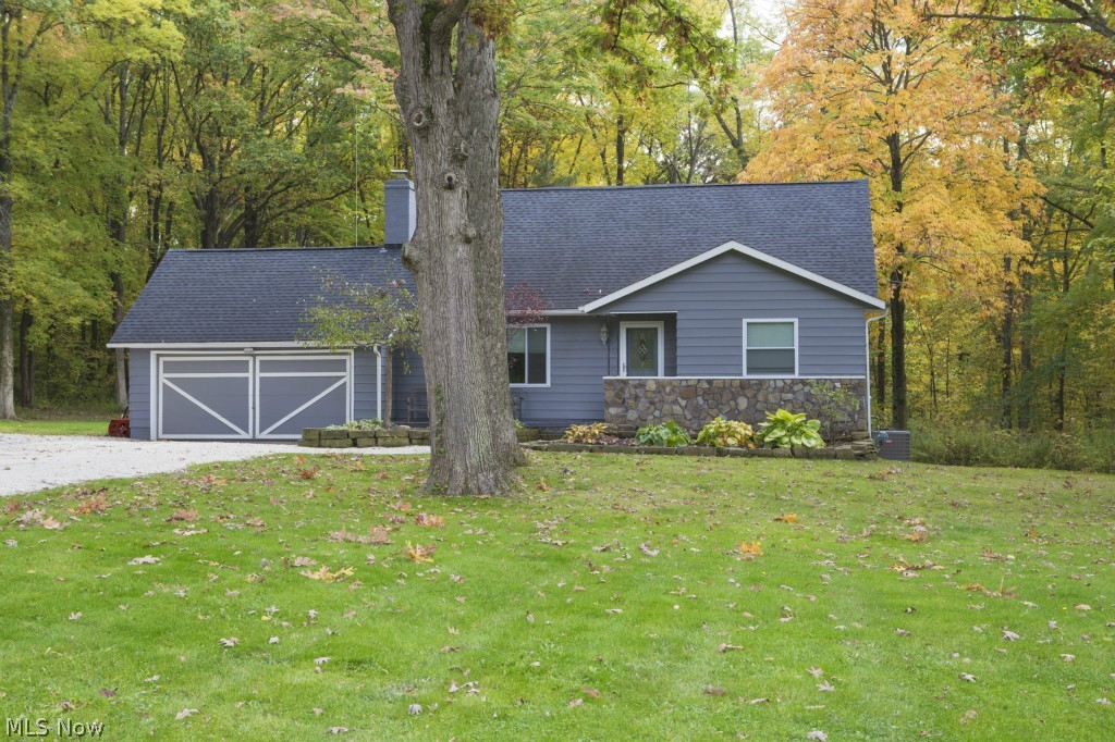 Wow! This 3 bedroom Cape-Cod on 1.97 private acres is completely updated with the highest quality craftsmanship and materials: bamboo floors, poured concrete counter tops and cherry cabinets. This kitchen has everything you could want, including the picturesque view through the large windows. There is a 2 car attached garage, a finished basement, and a 24x24 outbuilding with electric. Upstairs master bedroom has an attached full bathroom. Updates include: new furnace, new ac, new roof, new well pump, new windows. All of the appliances stay, including the washer and dryer. The sellers are also offering a 1-year home warranty with the purchase. Call today to setup a private showing!