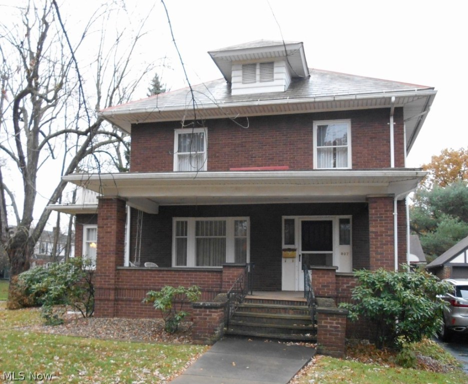 Lots of potential in this 1852 sq.ft. brick home with 2 car garage on a corner lot in a desirable N.E. Massillon location. The first floor has a large eat in kitchen, dining room with built in window seat, living room with fireplace and built in book shelves, sunroom and half bath. Second floor has 3 bedrooms and full bath. Walk up attic with lots of storage. New 100 amp electrical service, new glass block windows in basement, some newer windows first floor. This home needs some work and updates but will make a beautiful home. Home from estate sold as is, seller to make no repairs.