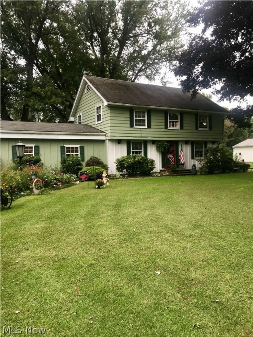 Looking for a mini farm minutes from I-90, shopping, Lake Erie? This 4 bedroom Colonial has so much to offer. Featuring a Large family room, formal living room with stone fireplace, beautiful hardwood flooring & wormy chestnut wood gives much detail to the living room, oak wood staircase, most of the doors are solid cherry. First floor half bath & laundry. Basement area features a partially finished room with bar area for entertaining & plenty of room for storage Pasture with Barn also there is a large attached pole barn to accommodate ATV's, lawn equipment, cars & more! Put this one at the top of your list you!