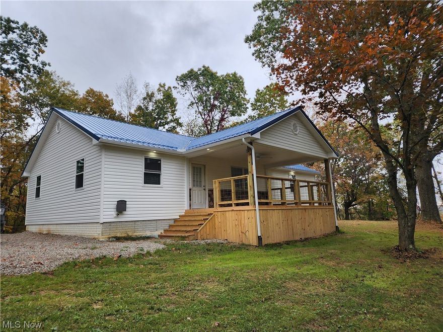 New custom built home nestled in Guernsey County. This 3 bedroom, 2 bath home has an open floor plan, one floor living, including laundry and is privately located about 1 mile from Rolling Hills Schools. Be the first to look at this brand new home. Make this house yours and enjoy the breathtaking wooded views from 3 different private decks. New septic, tankless water heater, high efficiency furnace, extra tall heated crawl space, over an acre of land, lighted faucet, security system, ceiling fans, led lighting, huge dual master closets and vaulted ceilings are just some cool features this home offers. Manufacturer warranties all transfer. The detached 2 car garage offers workshop area, water and electric. Come take a look at this gem today!