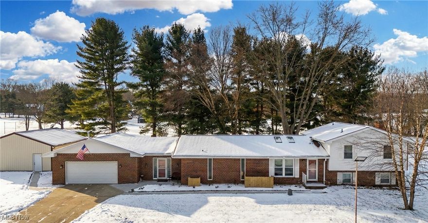 Welcome home to 570 East Turkeyfoot Drive, a beautifully updated split-level retreat in the heart of Green—home of the Green Bulldogs. Spanning over 3,500 square feet, this thoughtfully refreshed home offers 4 generous bedrooms and 3 full baths, perfectly set on a serene 1.8-acre lot that blends privacy with convenience.
Step inside to discover spaces filled with abundant natural light, brand-new carpet throughout, and gorgeous hardwood floors that add timeless character. Designed with entertaining in mind, the home flows effortlessly between living areas, offering room to gather, celebrate, and relax. Outdoors, enjoy three separate patios, ideal for hosting summer cookouts, quiet morning coffee, or evening conversations under the stars.
Car enthusiasts, hobbyists, or those needing extra storage will appreciate the impressive 28x32 pole building, providing endless possibilities for parking, projects, or recreation.
This home offers true peace of mind with all-new electrical, plumbing, furnace, air conditioning, and roof, allowing you to move in and enjoy without worry. With its spacious layout, extensive updates, and inviting setting, 570 East Turkeyfoot Drive isn’t just a house—it’s a place to truly live, entertain, and call home.