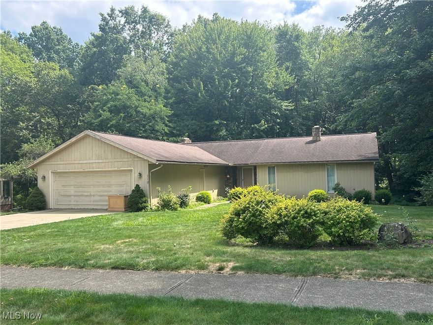Spacious ranch in the Woodridge Estates is waiting for a new family to make it their own.  This 3 bedroom/4 bath home has potential at every turn.  Kitchen is spacious with an abundance of cabinet space and features and eat-in option.  Leading out of the kitchen you will find a large entryway from garage, laundry area, and half bath.  In addition to the eat-in space in the kitchen, there is also a formal dining area that leads to an overlook deck of the private backyard and creek.  Dining area flows into the large living area and front entry way.  First floor also features master bedroom with full bath, two additional bedrooms and second full bath.  Basement boasts additional living space with large living area with fire place, walk-out to back yard and large windows.  Living area leads to another finished room that could be used as an office, bedroom, or toy area.  It doesn't stop there.......another bathroom and two additional storage areas make the basement complete!