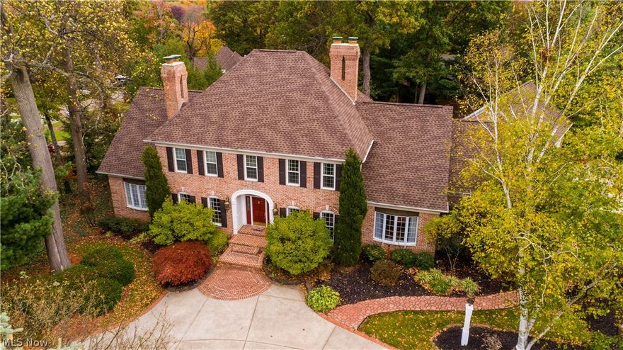 Truly above & beyond phenomenal all brick 5 BR/5.5 BA, 2 story in Foxchase Hills w/3 fireplaces (one see thru), 4614SF plus additional 1700SF in finished lower level on beautiful corner/cul de sac .68 acre plus 3 car side load garage* Quality built starting with the impressive entry with curved staircase* 2 story & 9' ceilings* Double crown molding & rounded arch ways* Oversized windows..very light and bright* Wood floors..most rooms on 1st flr* 6 panel poplar doors* 1st floor master w/glamour bath & 1st floor office w/fireplace & built ins* Eat in kitchen w/see thru fireplace (to living room), granite counter top, island chefs pantry, desk, fully applianced & access to deck* Great room with fireplace, wet bar, coffered ceiling & access to 2 decks* 1st floor laundry/mud room off of garage w/built in ironing board, cupboards/counter for folding & back stair case to second level* 2nd floor w/4 bedrooms (2 w/jack & jill & 1 w/private bath), guest bath, plus bonus room w/access to back sta