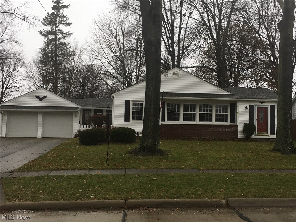 Solid 3 bedroom ranch ready to move into. Large living room with good natural light, reading room with wood burner, hardwood floorings in most rooms.
Enjoyable backyard with pergola complete with gas and electric and extra an concrete area. Mostly wood privacy fence. Breezeway leads to back wood deck with security lights. Convenient large brick flower box out front. Vinyl siding, fresh paint, glass block windows, ceramic in kitchen and baths, concrete drive, city sewer and water, great location near schools, highways, shopping, and restaurants. Appliances include refrigerator, nice gas stove with grill, dishwasher, central air, washer and dryer. Home Warranty included for extra peace of mind. Large recreation room in lower level with fireplace and a full bath. Charming arches, good storage areas. Two (2) car garage with opener and drain. Easy to view and immediate possession offered.