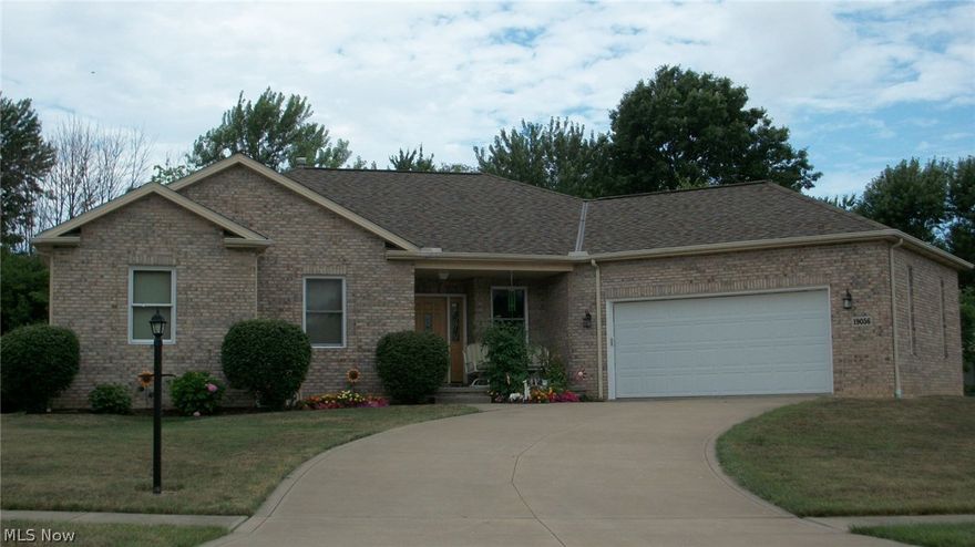 BACK ON THE MARKET.....Check out this fantastic custom built brick front ranch with great open floor plan and natural woodwork throughout. Enter into the open foyer with dining room to the right and offering 10' ceilings and crown molding, then on to the Great room with brick gas fireplace and completely open to the fabulous kitchen with breakfast bar, ceramic flooring, loads of Hickory cabinets, corian counter tops plus eating area that overlooks deck and wooded area. Master bedroom with tray ceiling, Duofold blinds, large walk in closet, mater bath has 6" whirlpool tub and glass block windows. Deck is maintenance free with retractable awning for those too sunny days.  Lower level is plumbed for a third bath, has a 34x20 Rec room also a kitchen area with stove, refrigerator, freezer,  and workbench. There is another gas heating stove in lower level. Extra wide doors will accommodate a wheelchair....  See attachments for all upgrades...