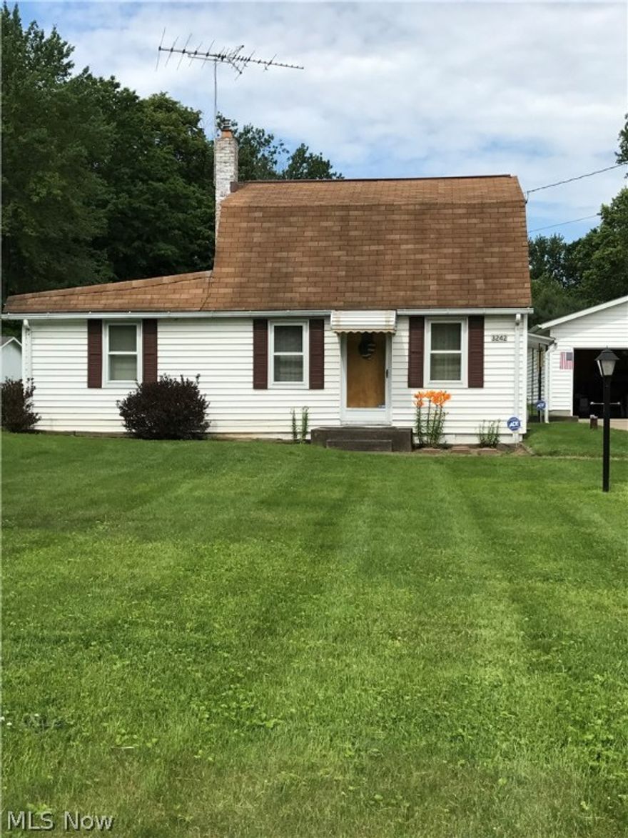 JUST REDUCED!!! $89,600. 
CALL TODAY FOR AN APPOINTMENT TO SEE THIS...
Adorable Cape with .95 acres. 2+ car garage with workshop area). Outbuilding.
Furnace is A/C ready.  Custom made Birch cabinets in kitchen.
Submersible pump (air tank)
First Floor laundry.  Sun/Mud room is great for enjoying backyard living.