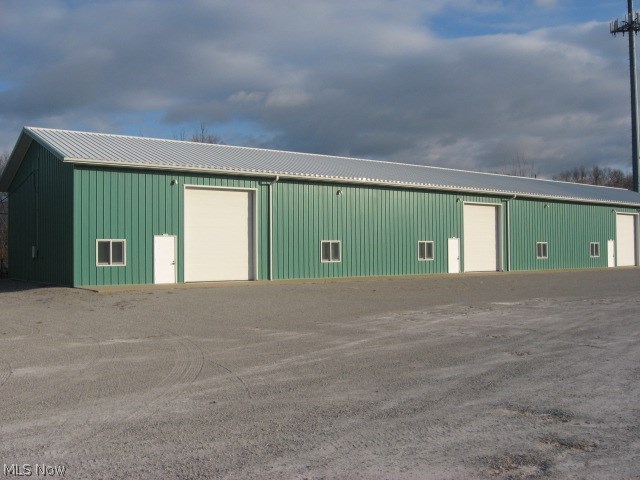 Excellent buildings, exceptionally clean and well maintained. Small office in the space. Great access for Semi Trucks. Location good for access to east, west, north, or south for commerce. Below market rates for this type of building. Could be the nicest and best priced buildings for lease in Berea. Perfect fit for small to medium size business. On Lewis Road north of Bagley Road. Second drive to the east. Drive to the rear of the property to the green buildings. Client can move in immediately upon signing of lease. 14 ft overhead door and Radiant Heating.