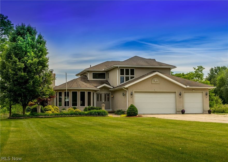 Welcome to 2188 Palm Road   Suffield, Ohio  44260.   This Beautiful custom home awaits a new owner.  Three very spacious bedrooms on the second level includes an amazing master suite with 3 closets, a full bath that includes double sinks, shower , whirlpool tub and relaxing sitting area.  There is an additional full bath to accommodate the other two spacious bedrooms.
Take the multi level stairway down to the main level and enjoy a formal area that includes a  fireplace living room and formal dining enhanced with an abundance of natural light.  
step into the newly updated eat in kitchen that overlooks the fireplace family room.  The open concept is great for entertaining. Steps away enjoy a large deck .  Great way to enjoy gatherings and the great views of this 1.5 acre property.    Just off the family room is a first floor bedroom/office or den.  So many options for this room with a full bath near by.  First floor laundry tops off the main floor includes the washer and dryer.
Anot