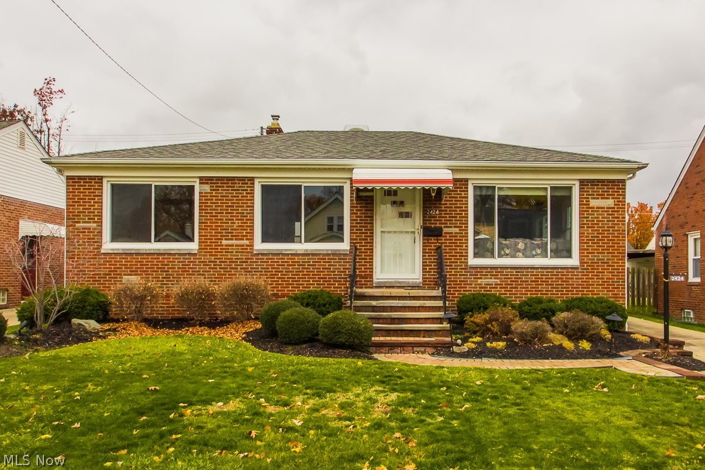 Maintained to the highest of standards, this brick front ranch is ready for you and your family to enjoy. Hand laid paver walkway welcomes your guests to the front door. Gleaming solid wood floors are a focal point. Freshly painted rooms highlight the bright airy feel of this home. New windows all around, new marble look flooring in bath, mirrored closet doors in bedrooms. Appliances are included along with mobile island for ease of cooking. Central A/C tops off a newer HVAC system, brand new H2O tank. Partially finished basement is great for additional family room, crafts or "Man Cave". Warranty included for complete peace of mind.