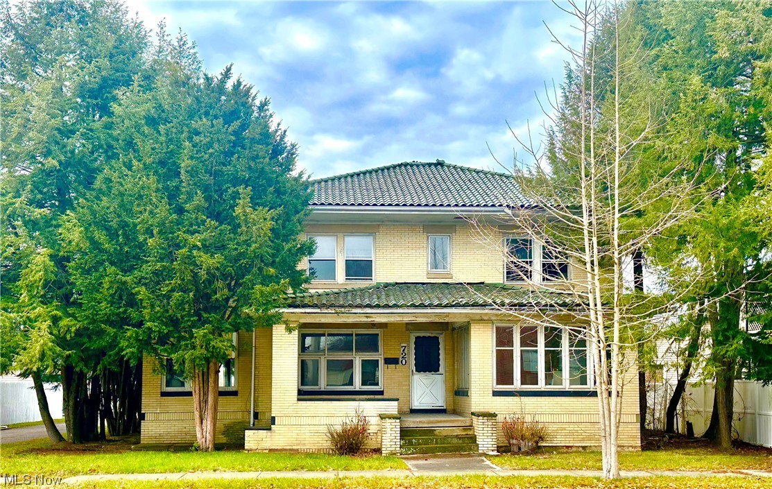 Do you want to own a piece of history? This 5 bedroom grand home is a remarkable opportunity for those seeking a property with charm and potential while making it their own! While it requires some renovation and repairs, the house's rich history and unique architectural features make it a truly special find. Situated on a city lot, residents will enjoy the convenience of urban amenities. With its blend of history, character, and functional elements, this fixer-upper presents an exciting project for those looking to create a beautiful and distinctive home. This home also features 2 sunporch's designed with walls made entirely of windows, allowing for abundance of natural light to flood the area with views of the surrounding landscape creating a serene and inviting atmosphere. Get ready to cozy up, read a book, or simply enjoy the beauty of nature. This property also includes a detached two-car garage, providing ample parking and storage space. Additionally, the garage features an upstairs 2 bedroom apartment, offering potential rental income or a private guest suite. Call me today to schedule your private showing. I can't wait to see what you do to make this home your own!