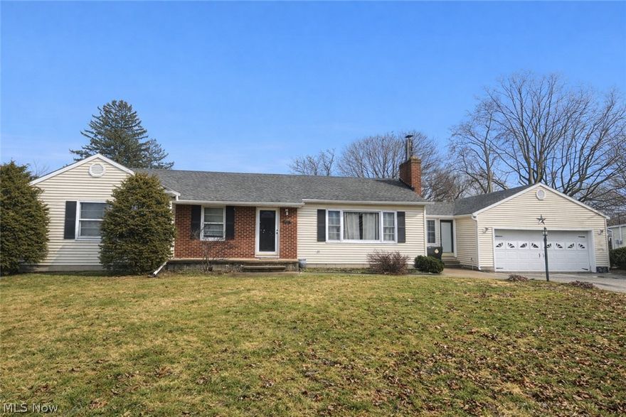 Enjoy easy one-floor living in this well-maintained 3-bedroom ranch home located just off Lake Rd in Ashtabula and close to Lake Erie and a local park. Situated on three parcels, the property offers extra yard space and flexibility. The home features a brick and vinyl exterior, a 2-car attached garage, and a backyard with an above-ground pool for summer enjoyment. An enclosed breezeway connects the home and garage, creating the perfect mudroom space for coats, shoes, and everyday storage. Inside, the living room is highlighted by a warm brick gas fireplace, while the dining area showcases oak wood flooring. The kitchen offers wood cabinetry, all appliances included, and convenient access to the rear yard. Wood flooring continues mostly throughout the three bedrooms. The full basement is partially finished and thoughtfully divided, offering space for a recreation room along with an additional area ideal for a home office, workshop, or hobby space. There is also plenty of storage and a dedicated laundry area. A wonderful opportunity for comfortable living near the lake with room to grow.